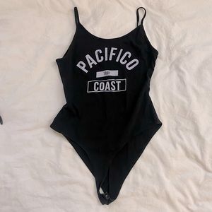 Charlotte Russe Black White Pacific Coast Strappy Low Back Snap Bodysuit